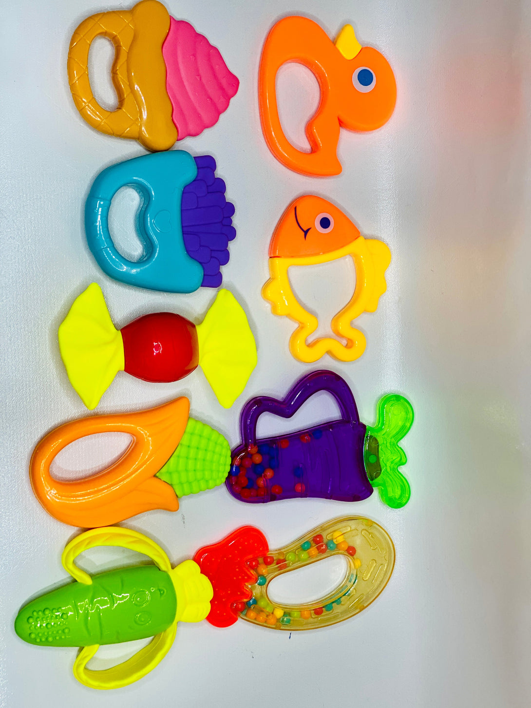 9 PcsDifferent Shape Teether Rattles For Babies In Different Colors - Trendytoys